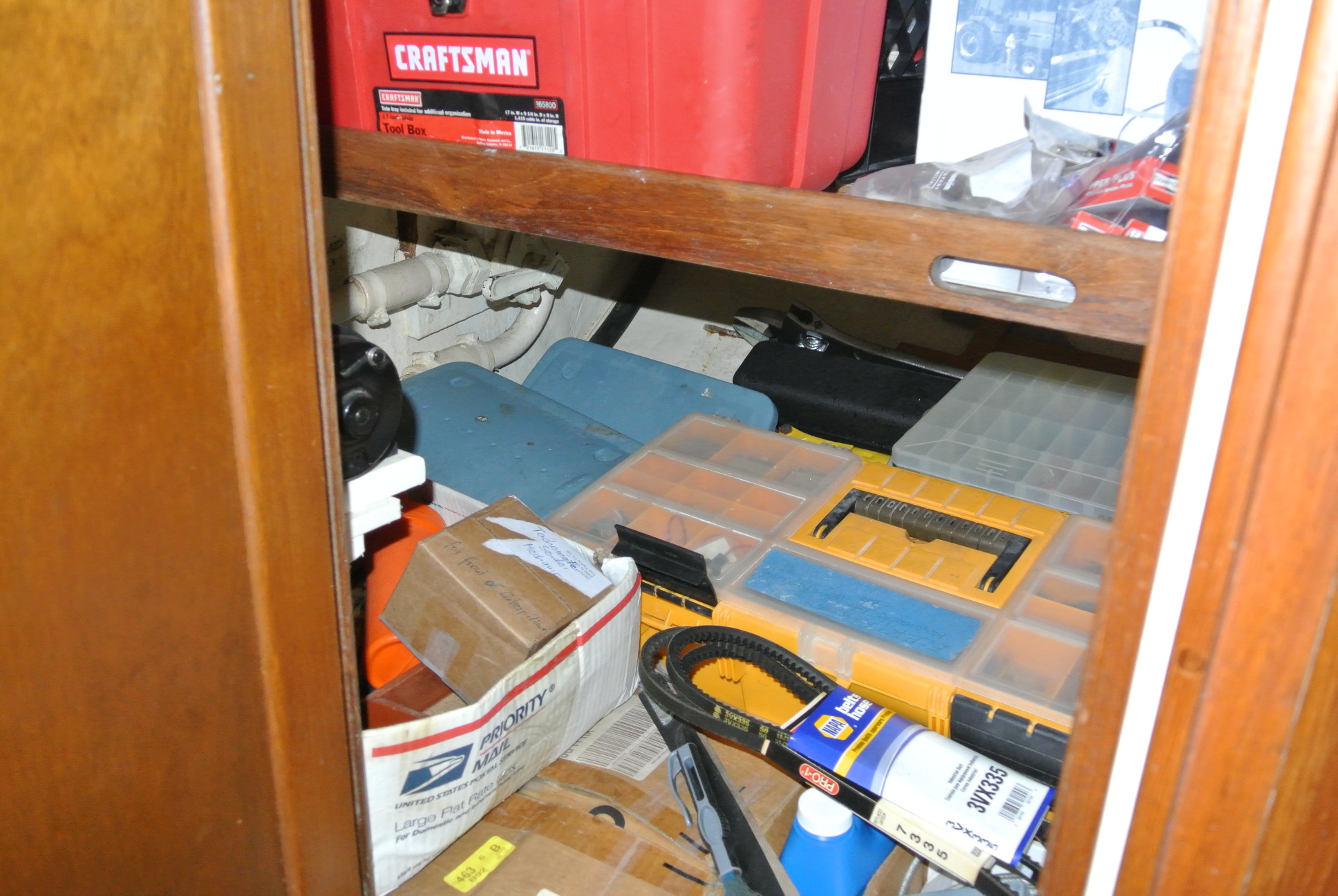 Spare parts in locker in the master stateroom.